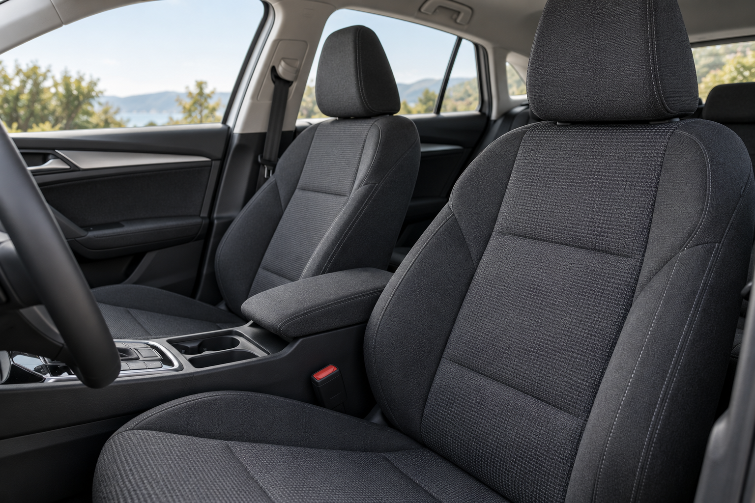 Sièges avant d'une voiture en tissu gris